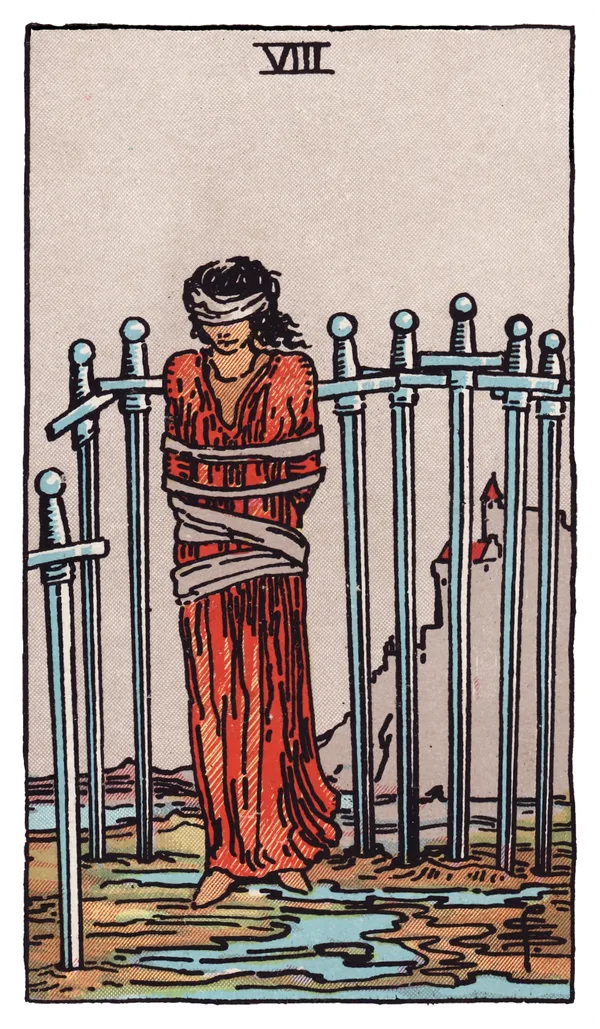 The Eight of Swords from the Rider-Waite-Smith deck: a woman stands blindfolded and loosely bound, surrounded by eight swords planted upright in the muddy ground around her forming a loose, incomplete cage, a castle visible on a hill in the distance, the ground beneath her feet clear of any barrier.