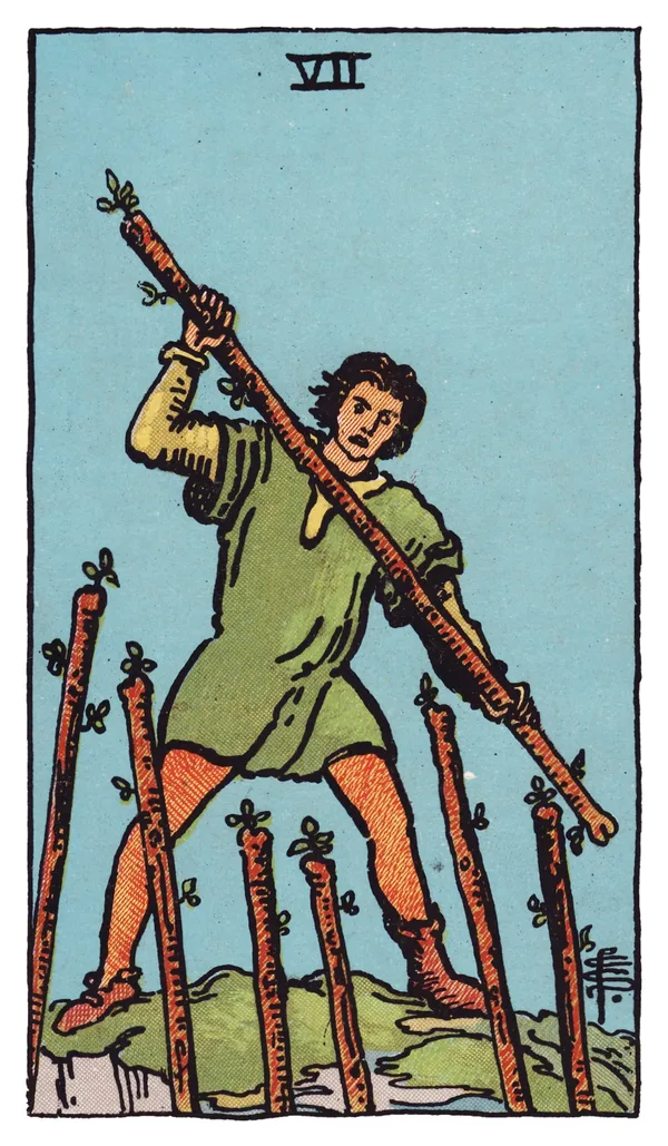The Seven of Wands from the Rider-Waite-Smith deck: a young man stands on uneven, elevated rocky ground gripping a wand and swinging it down defensively at six other wands jabbing up at him from below, one of his boots mismatched with the other.